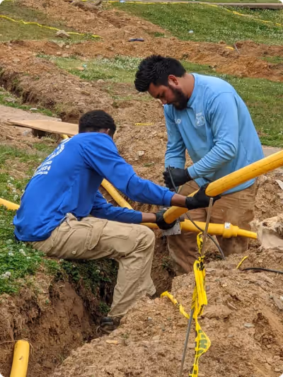 Diamond State Plumbing crew installing underground gas lines